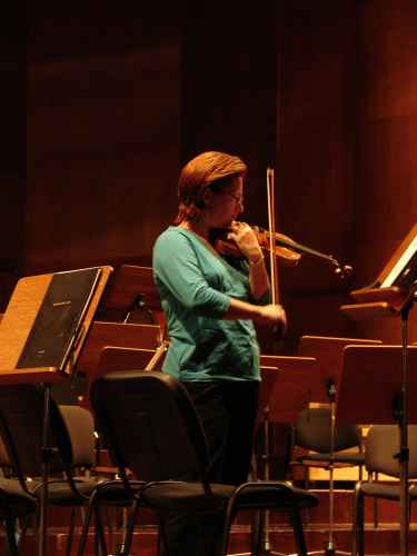 Photo taken the day before recording, violinist Rebekah Binford rehearses alone in János Richter Hall. János Richter Hall, Győr, Hungary (20 September 2007)