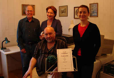 Photo taken after editing the recorded Concerto for Violin and Orchestra: from left, composer Harold Schiffman, recording engineer (front) István Biller, violinist Rebekah Binford, interpreter Szidónia Juhász. Budafok, Hungary (22 September 2007)