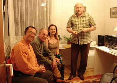 Photo during the presentation of the completed mastered CD: from left, producer Dávid Zsolt Király, composer Harold Schiffman, interpreter Szidónia Juhász, and recording engineer István Biller. Budafok, Hungary (24 September 2007)