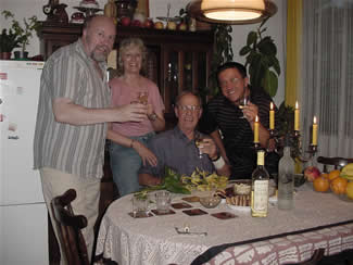 Photo of Reception after mastering the CD of Alma, Prelude and Variations, and Chamber Concerto No. 2:  István Biller, recording engineer; Jane Perry-Camp, pianist; composer Harold Schiffman; recording producer David Zsolt Király (President Kiraly Music Network). Budafok, Hungary (19 June 2003), Photograph by Szidónia Juhász