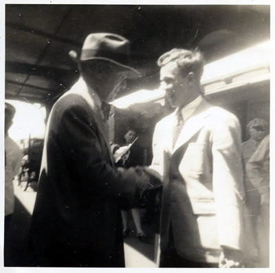 Harold Schiffman with Randall Thompson at the Greensboro Railroad Station, seeing Thompson off for Thompson's return to Princeton. Greensboro, North Carolina (Spring 1946) Photographer unknown