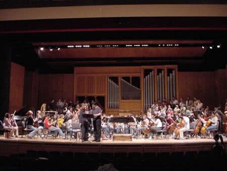 Photo of dress rehearsal:  Nadine Cheek Whitney, mezzo-soprano soloist; Alexander Jiménez, conductor; The University Philharmonia; The University Singers. Opperman Music Hall, The Florida State University College of Music, Tallahassee (14 April 2005)