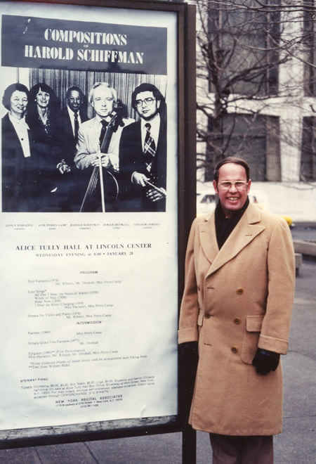 Photo of Harold Schiffman standing outside Alice Tully Hall, beside the poster for the January 28, 1981 all-Schiffman concert in Alice Tully Hall, Lincoln Center, New York City.