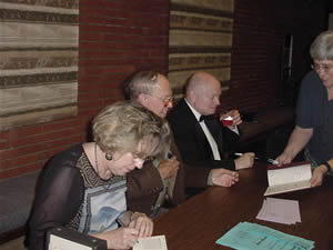 Photo of book and CD signing: Poet Kathryn Stripling Byer, composer Harold Schiffman, violoncellist David Moore. Coulter Recital Hall, Western Carolina University, Cullowhee, North Carolina (26 August 2004)