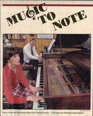 Photo accompanying newspaper article by writer John Habich who took to the fact that husband Harold had written his first piano concerto for wife Jane -- and that the world première of the concerto would fall on Valentine's Day, 14 February 1984 -- as if designed by Cupid himself.  The Tallahassee Democrat published Habich's article, "Composer's Valentine:  Be my pianist," on 14 February 1984 -- right on target.  The photo accompanying the article, by Mike Ewen, likewise made the point (and Jane's red blouse didn't hurt anything). (14 February 1984) Photograph by Mike Ewen courtesy of the Tallahassee Democrat