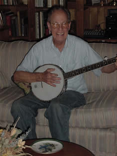 Photo of &ldquo;Harl&acute;s&rdquo; new open back banjo on his 77th birthday. Robbinsville, North Carolina (4 August 2005)