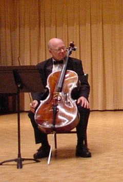 Photo of David Moore, violoncellist, at première of Wake (2003). Coulter Recital Hall, Western Carolina University, Cullowhee, North Carolina (26 August 2004)