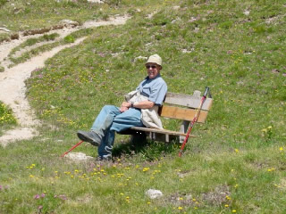 Photo of Harold Schiffman taking a break from hiking. Upper Engadine, Switzerland (29 June 2003)